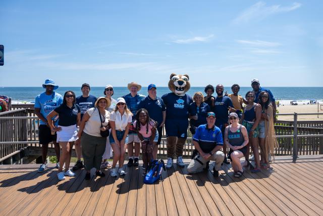 Alumni with Mascot at Long Beach