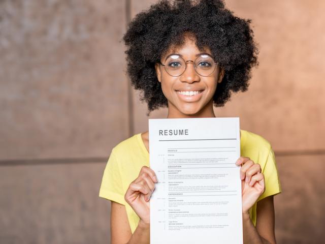 Young woman with resume